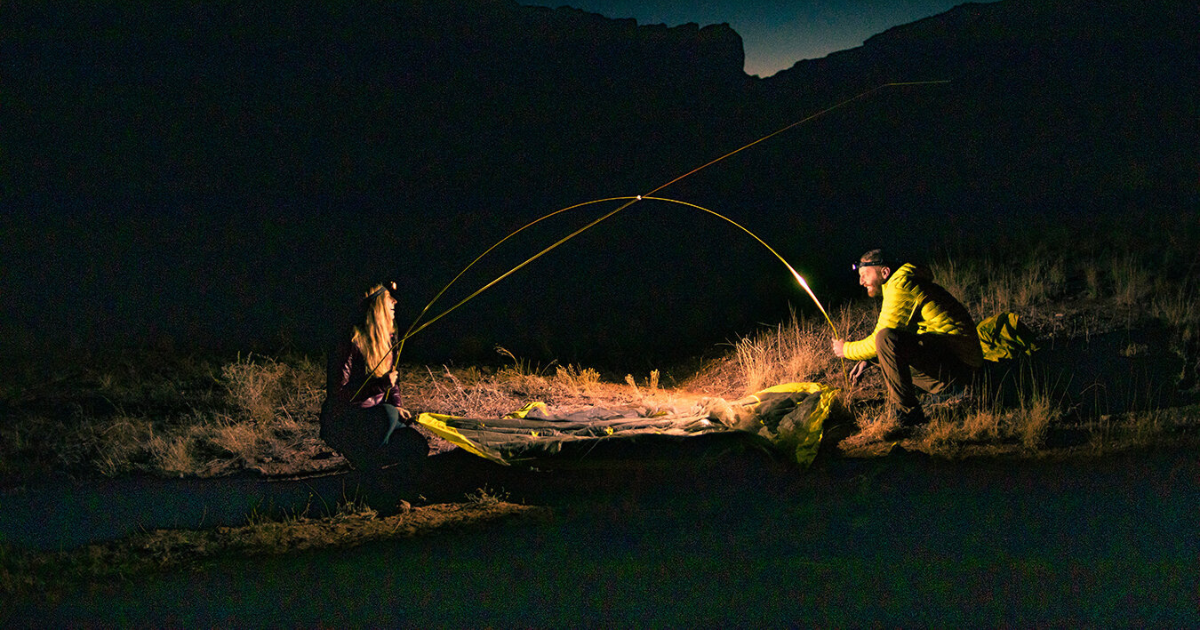 kristi and eric at camp with ledlenser headlamps in utah backpacking and hiking