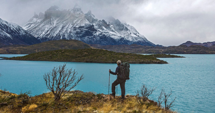 eric hanson overlooking a beautiful mountain landscape backpacking and hiking for beginners