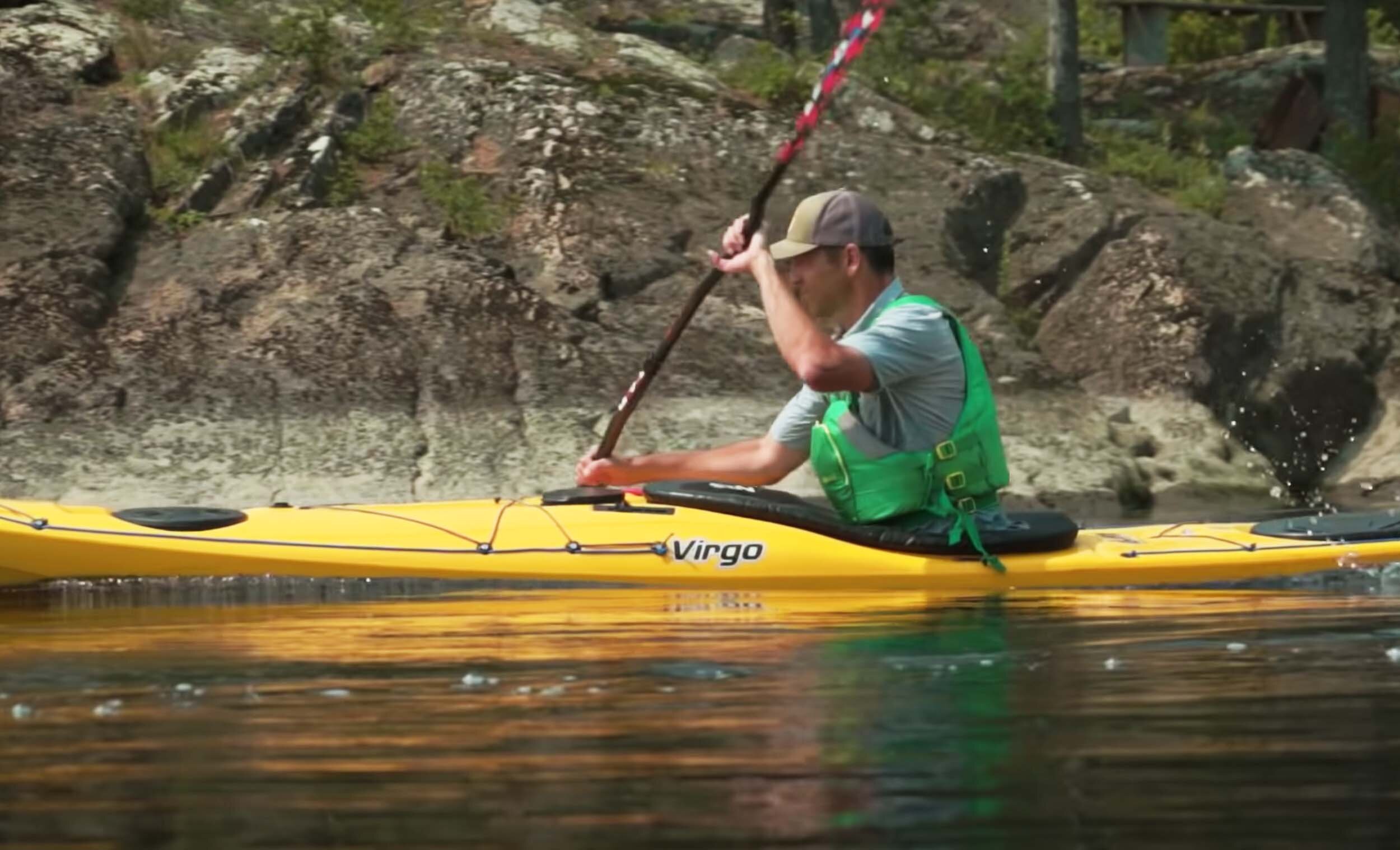 photo of ken whiting using the pandh virgo kayak in yellow on flat water kayaking and paddling gear reviews paddletv