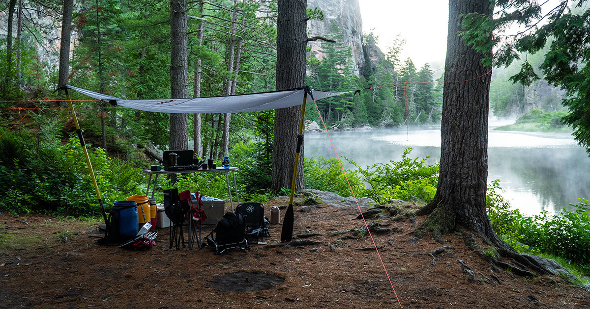 camp set up in algonquin provincial park on a fishing trip in canada ontario in the summer time