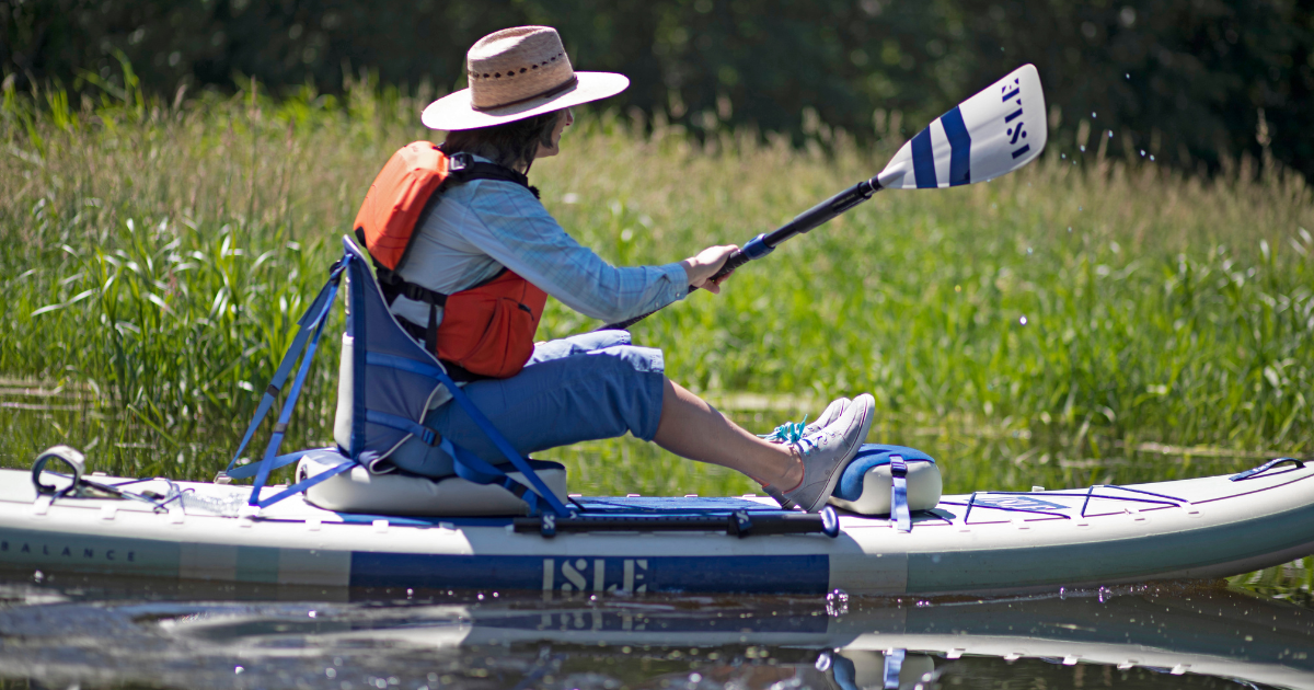 isle switch paddler kayaking through snake river ontario on a summer day