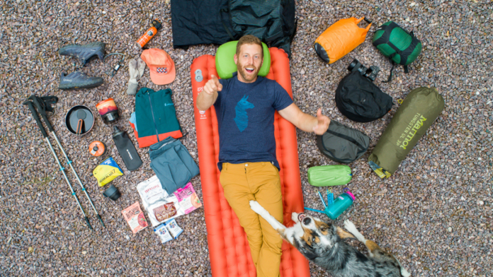 gear loadout for backpacking trip featured image eric hanson backpackingtv epic trails photo of eric with all of his gear