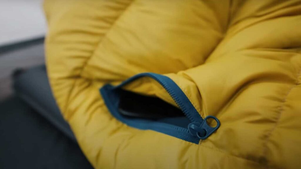 cold weather sleeping bags and winter sleeping bags: Cell pocket keeps electronics as warm as you on those freezing nights