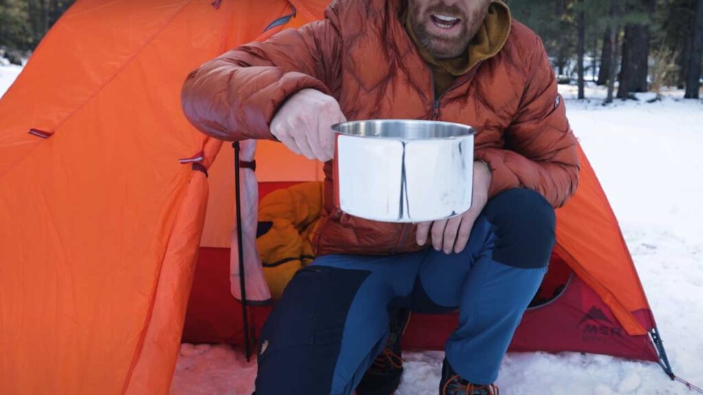 winter backpacking mistakes: Fill a cook pot full of water for your morning too