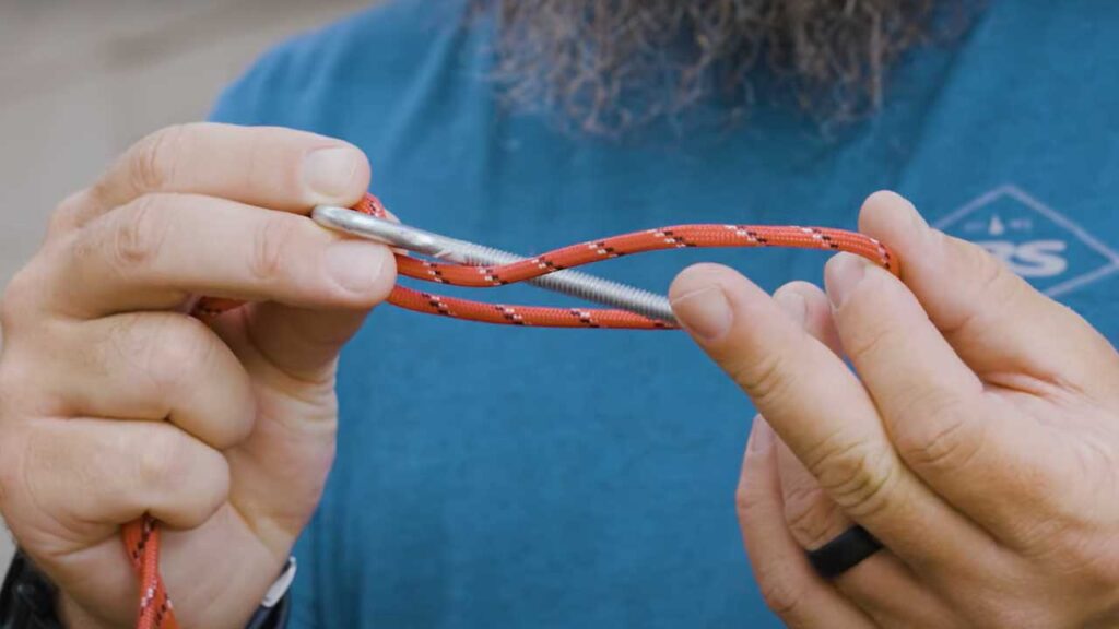 Palomar Knot: 6 - Pass the bait or hook back through the loop