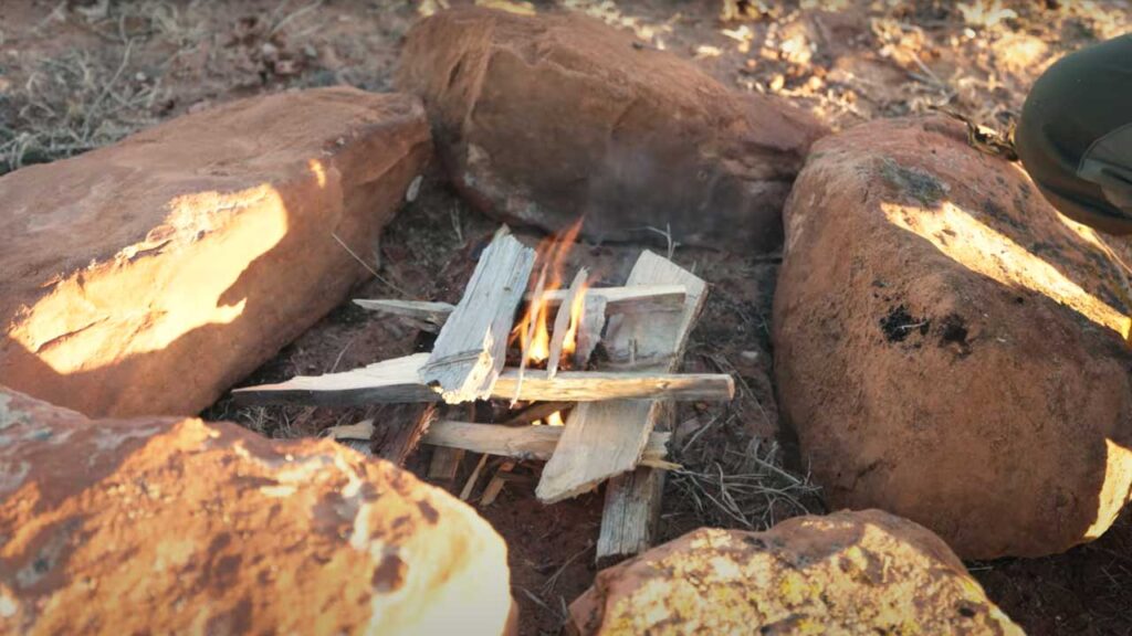How to Start a Fire in the Wild with Sticks Tip: Keep adding wood, as you would normally, till the fire is built 