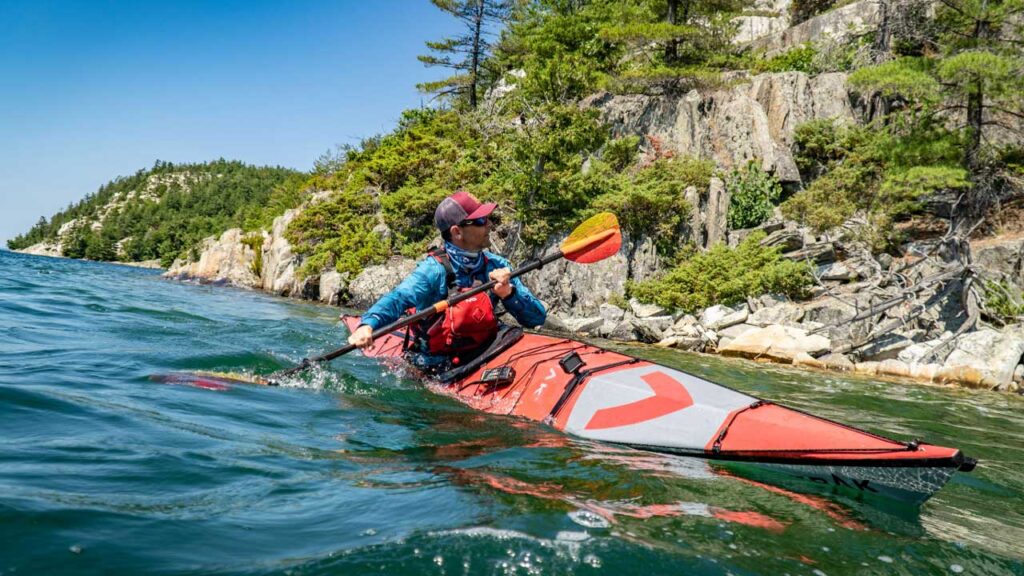 A tilt of your kayak into the wind will oppose the natural cocking