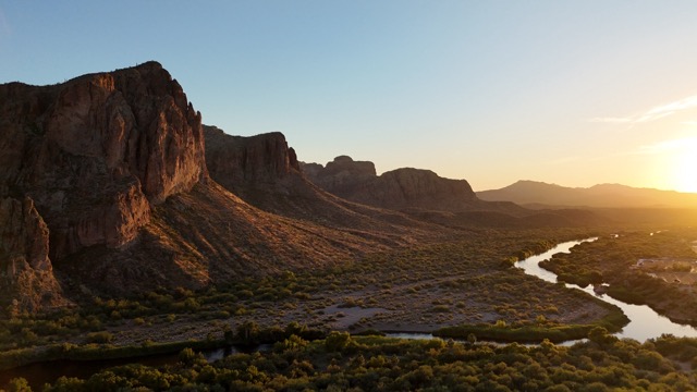 A mountain range and river at sunset on a clear day Scottsdale, Arizona