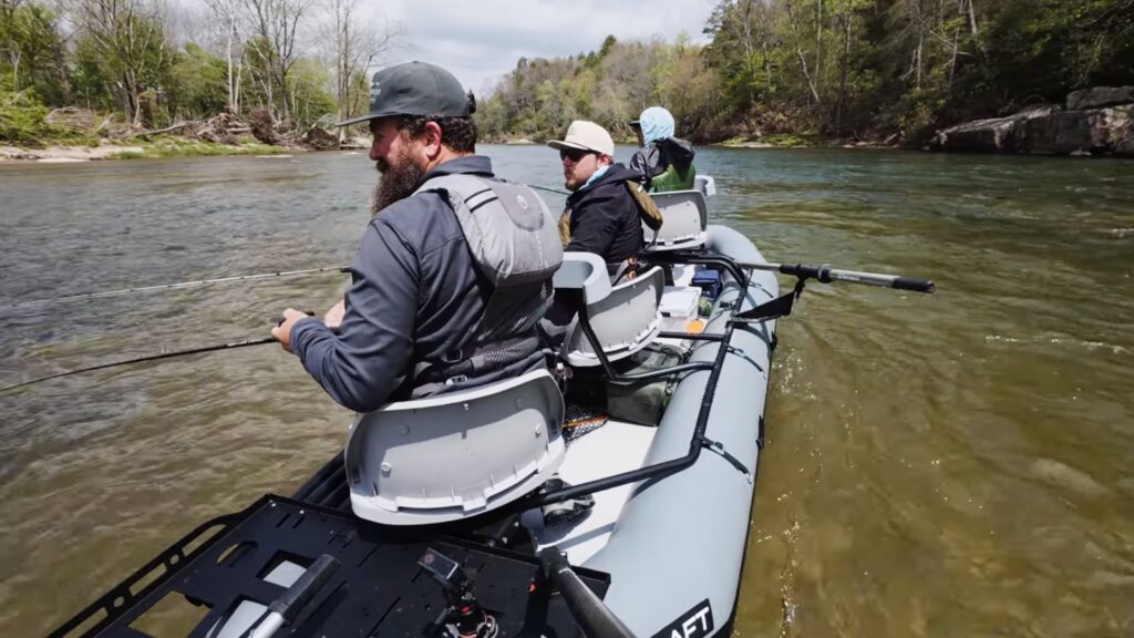 Flycraft Guide 3 fish package, three men sitting in inflatable boat