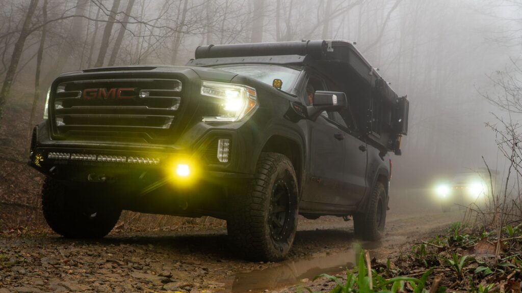 GMC Sierra truck, foggy shot of truck with lights on during the Georgia Traverse