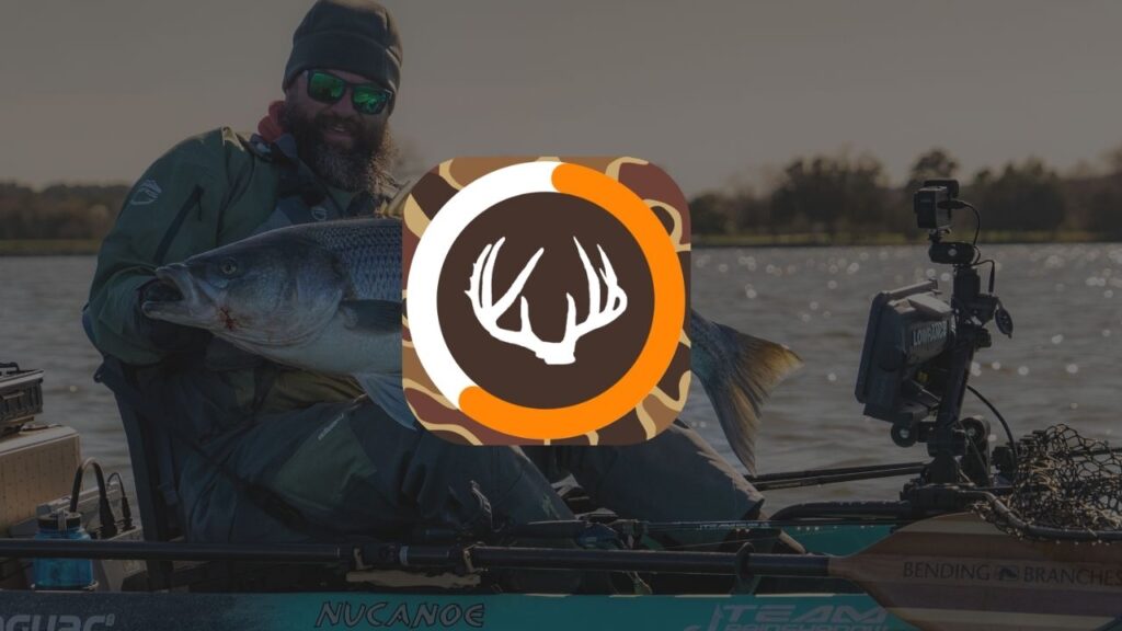 jameson on boat holding caught fish isolunar app