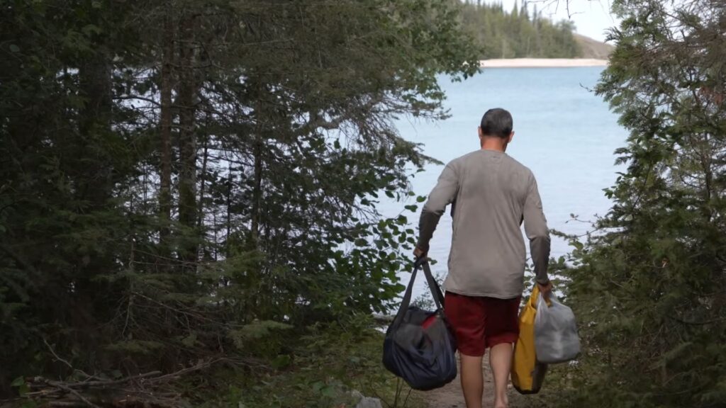 kayak camping , Ken carrying mesh bag