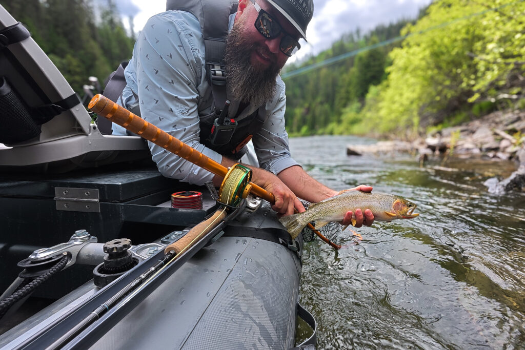 fishing in 3 person raft for trout in Idaho